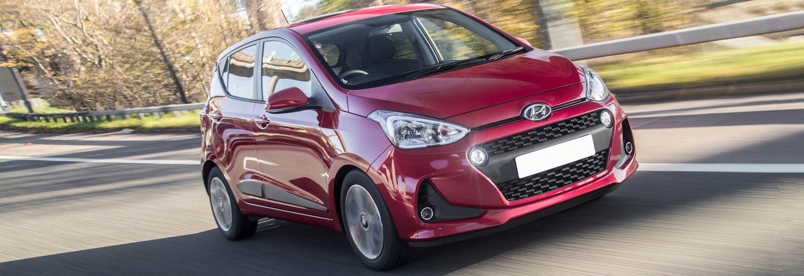 hyundai i10 red driving front